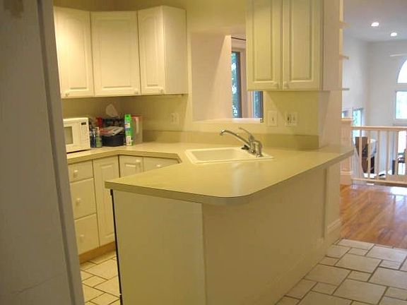 ample counter space for 2 , eat in with bar top overhang