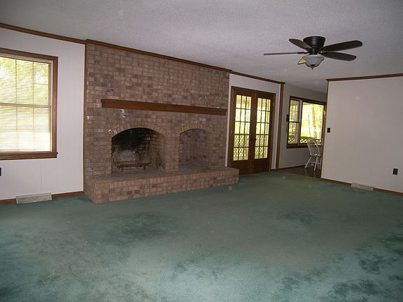 spacious den w/fireplace