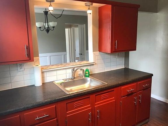 Kitchen with pass through to dining room.