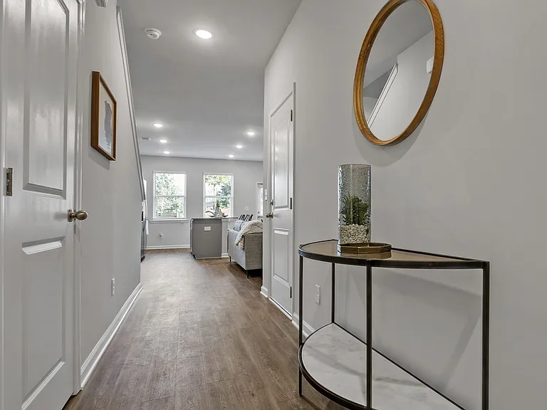 Inviting entryway featuring durable wood-style floors