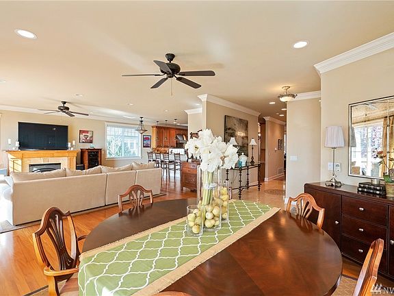Large, spacious dining area and living area with open kitchen concept.