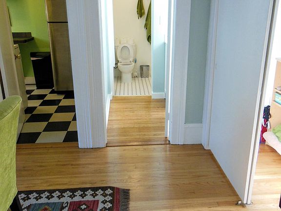 Left to right: entry to kitchen, bathroom, large walk-in closet on right