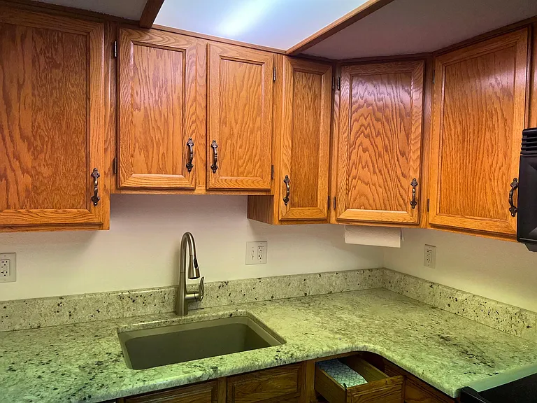 Large kitchen area; granite countertop