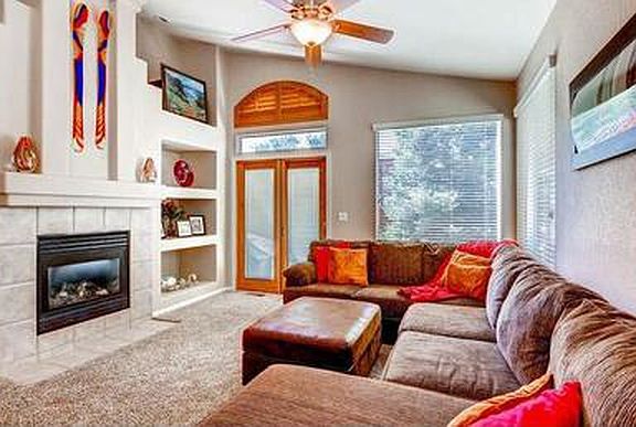 Den off Kitchen w Media area opens to patio!