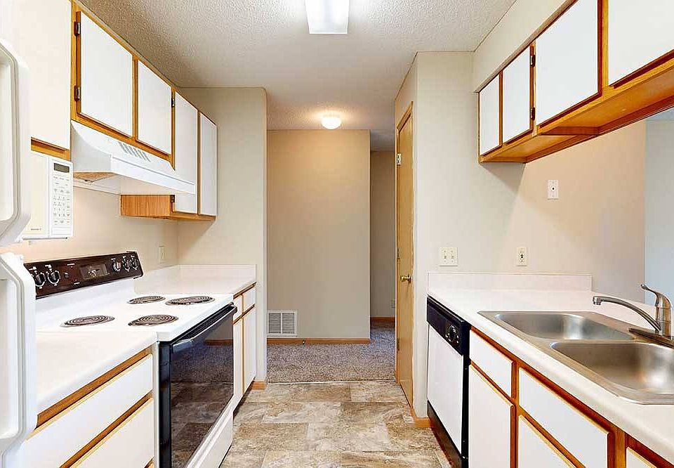 Efficient galley kitchens keep everything within easy reach to make meal prep and cleanup flow smoothly.