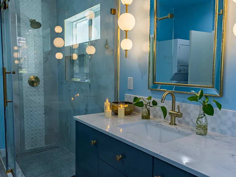 Walk in shower with Glacier Bay shower head. Overhead window to open during showers to prevent mold build up on walls and ceilings. Glass sliding doors with designer look for easy walk in access.