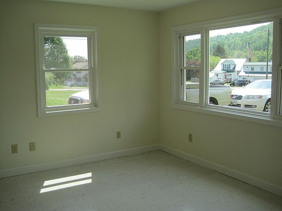 Living room windows facing south and west.