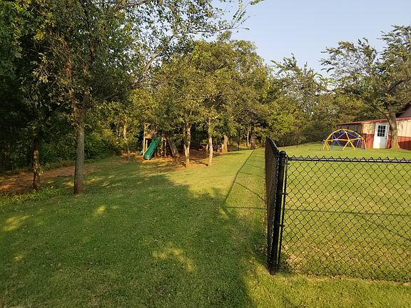 Fenced yard and play set 
