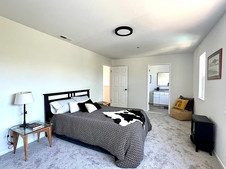 Primary bedroom and bathroom