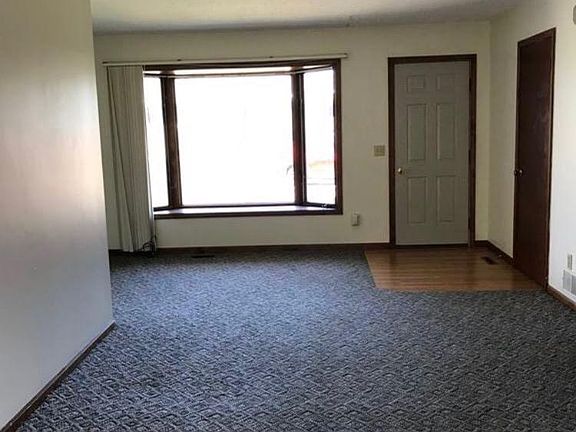 Large living room window for lots of daylight.