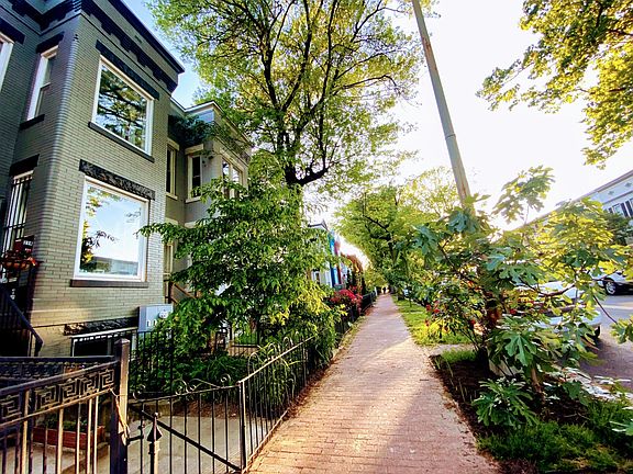 Sidewalk in front of row house