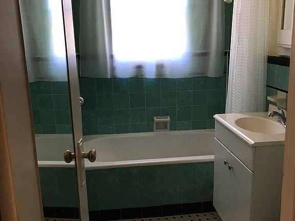 3rd image of 5723 Huntington Dr N APT 12