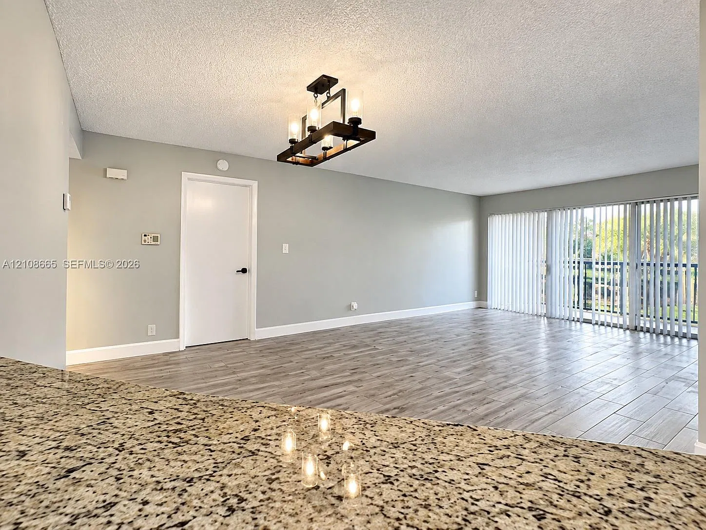 8955 Wiles Rd — Photo 4