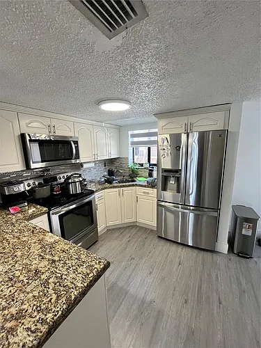 5580 W 26th Ct #204 Photo 1