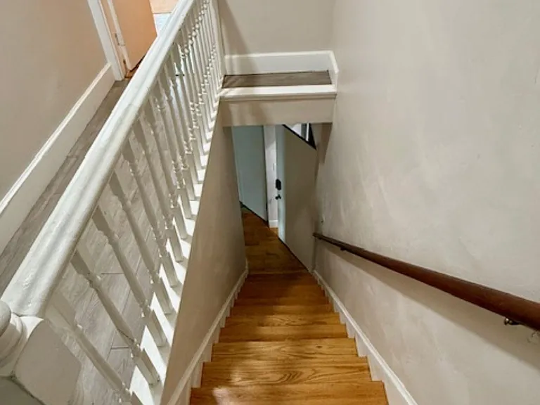 Staircase going down to common areas