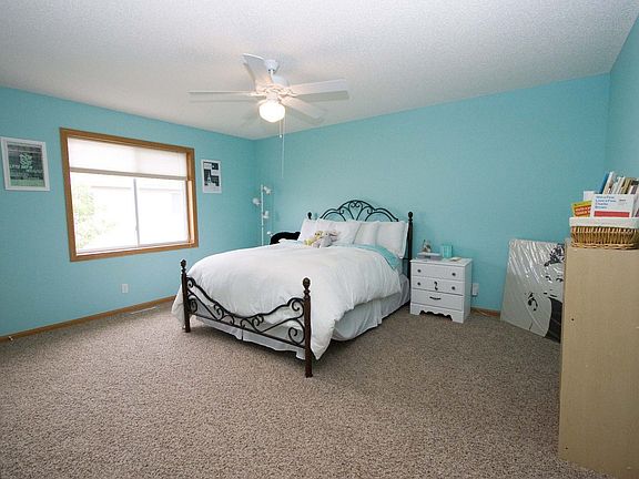 Huge master with full wall length walk-in clst & new carpet/lighting.