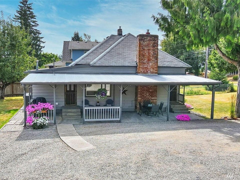 Welcome home! This lovely updated and immaculate home is just waiting for you! There is so much to talk about with this one! The kitchen and bathroom are completely updated and you'll find fresh paint, flooring, lighting, windows and window coverings throughout. No room has gone untouched here. Excellent craftmanship! All of this plus a 30X32 foot detached garage/shop with lots of storage and a very large built in work station. This property is over a half acre and is completely fenced with a gate at the driveway entrance. Also this home boasts many trees and plantings that will impress the most discerning buyer. Energy efficient gas heat and this home is on public sewer. All of this found just a short walk from Downtown Black Diamond.