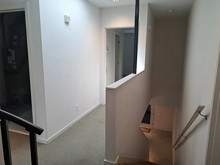 2 Bedrooms and 2 Full Bathrooms (one end of 2nd floor), Laundry in between rooms