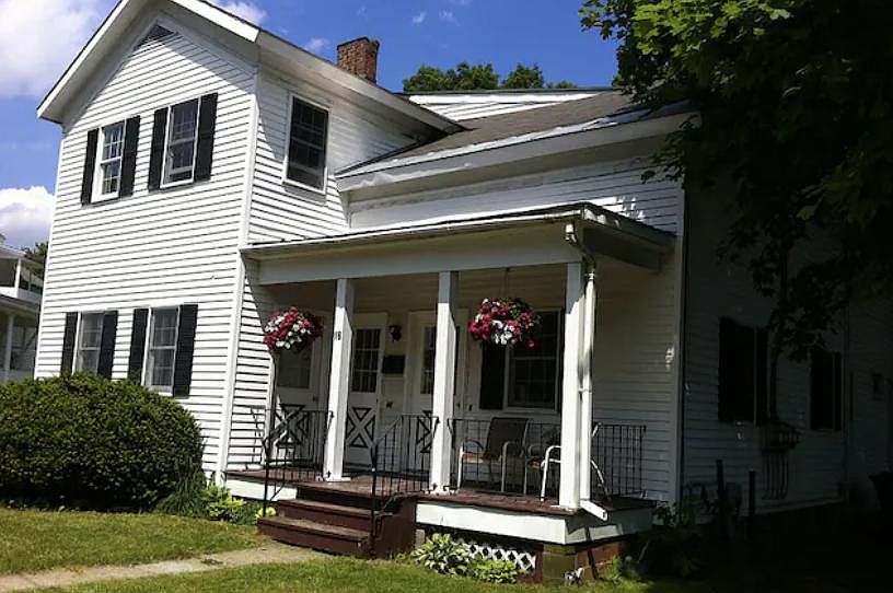 Front porch (apartment is far left door)