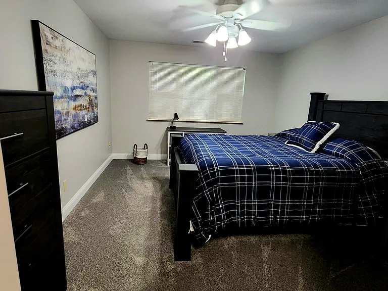King size bed offered in master bedroom