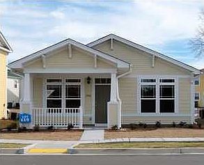 Front of Adorable Single Family Detached Home with Elegant Front Porch 