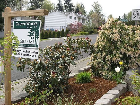 Perennial plantings mean the front of the home always looks nice and green