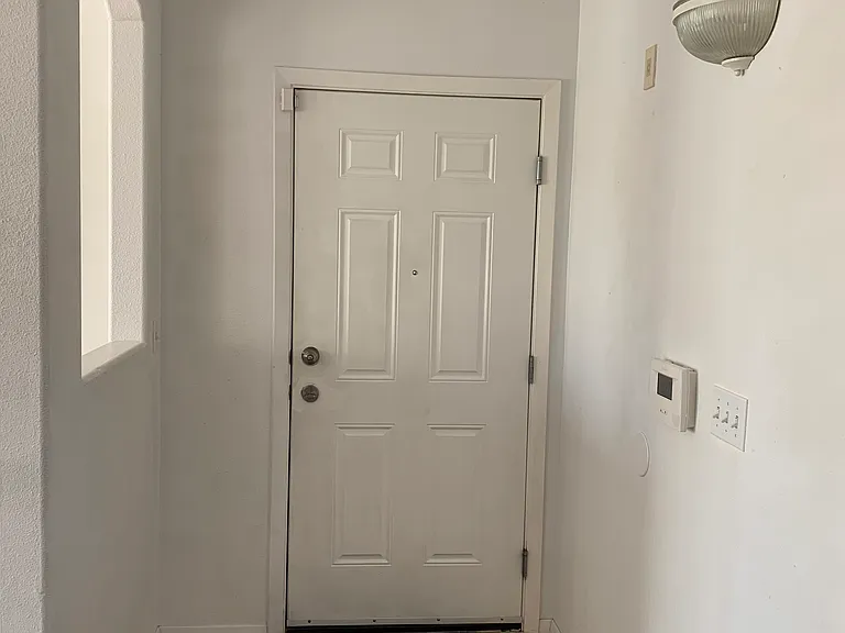 Front door with security alarm
