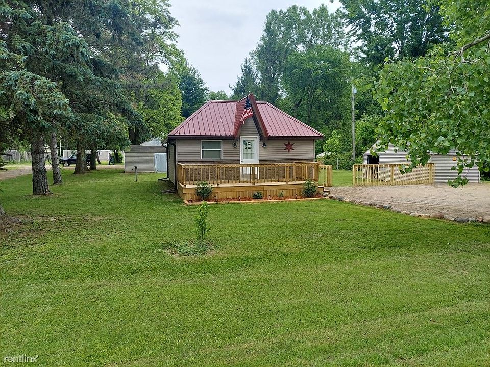 Front of house new deck, windows, landscape, n siding