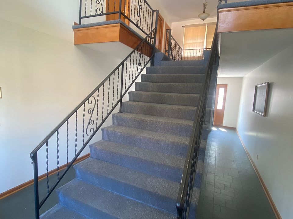 Main Hall Stair Access to Apartment Upper Left Picture. Inside Apartment is all on one level.