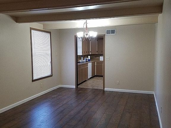 Living room looking to kitchen