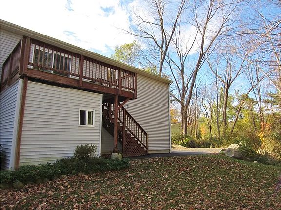 Nice size deck with a big storage shed built underneath!