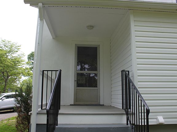 Back of the house with a porch