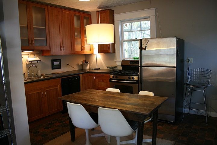 Beautiful cherry kitchen cabinets with stainless appliances,
