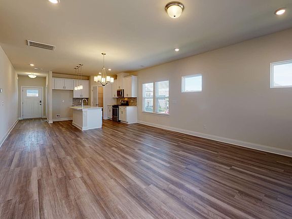 Large windows allow light to flood into your main living space.