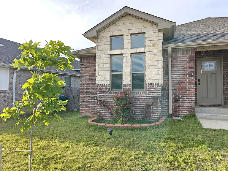 Tree and Landscaping in Front Yard