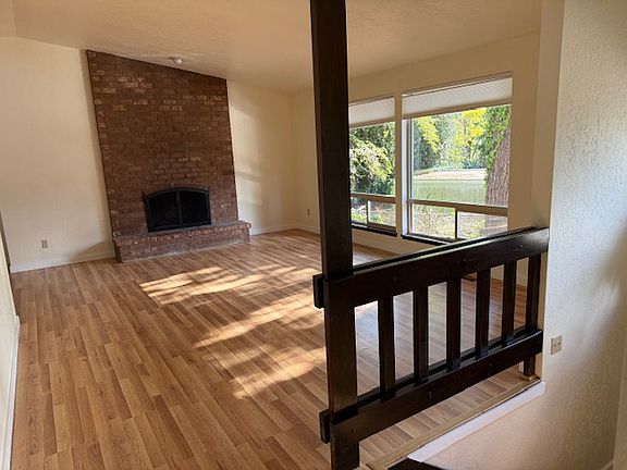 Living room view from hall and entry stairs