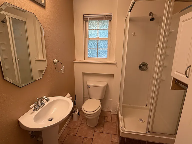 Efficiency apartment with walk-in shower