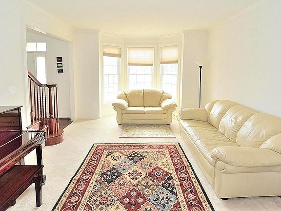 Light Filled Living Room Directly off 2 Story Foyer