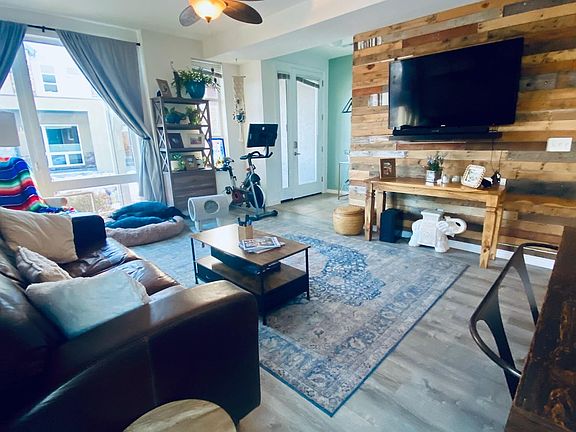 Large living space standing at sliuding glass door