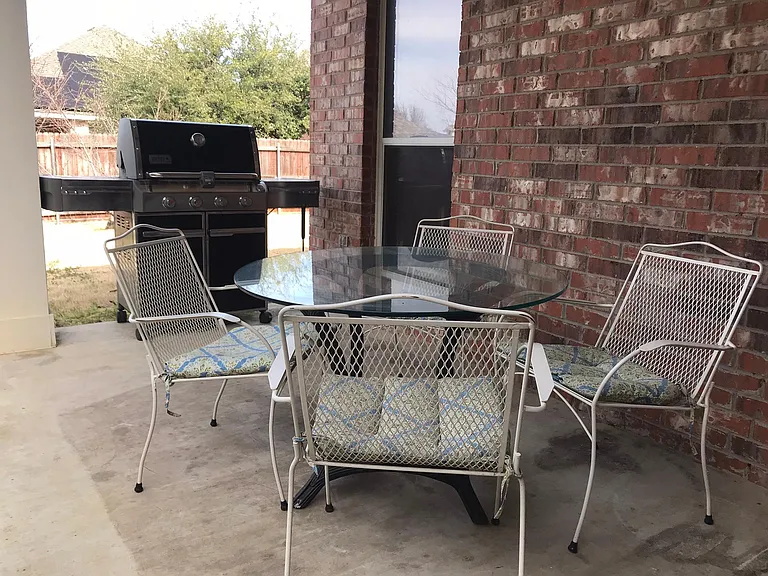 Relax on covered back patio.