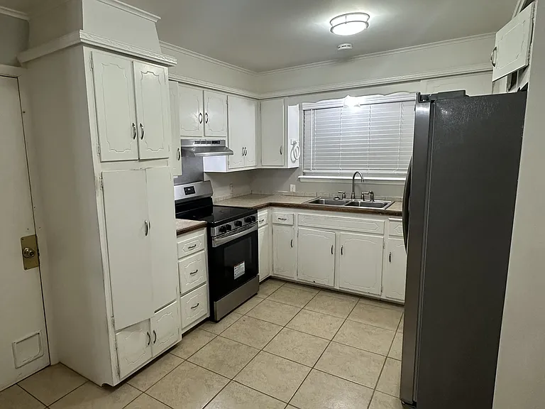 Kitchen- Newer Refrigerator, Stove, Sink