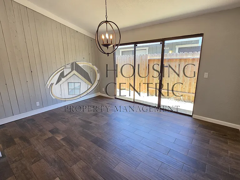 Spacious Dining Room with Slider to side and back yards.
