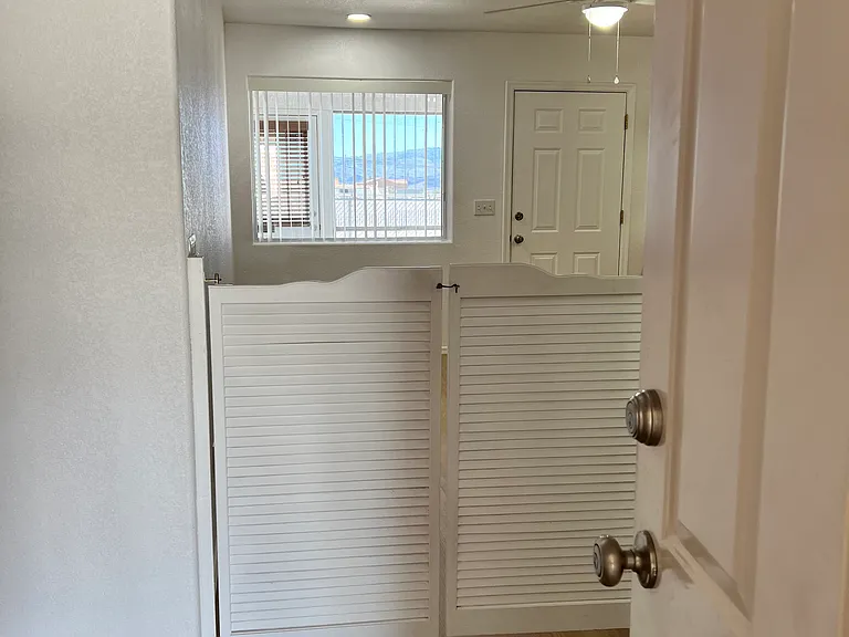 Kitchen saloon doors facing living room