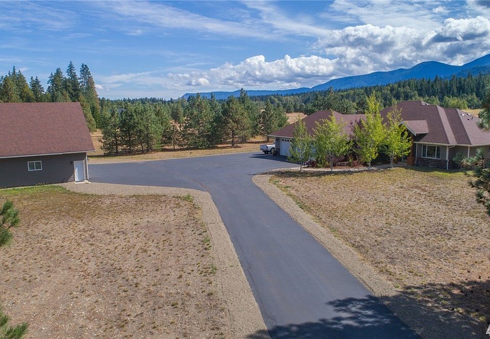 Coyote Creek is a large parcel, gated community with paved roads. This home is paved from road to home & shop for fantastic, easy access for you, your toys & equipment.