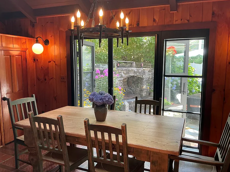 Kitchen with iron french opened to the patio.