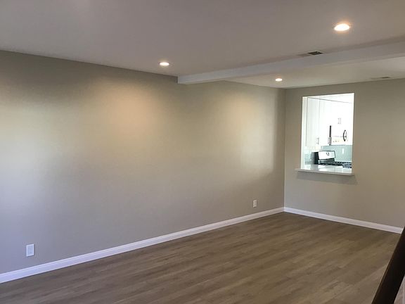 Living room view towards kitchen