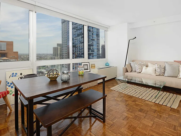 Living and Dining Room with Wood Parquet Flooring
