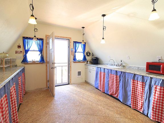 KITCHEN W/ DOOR TO DECK