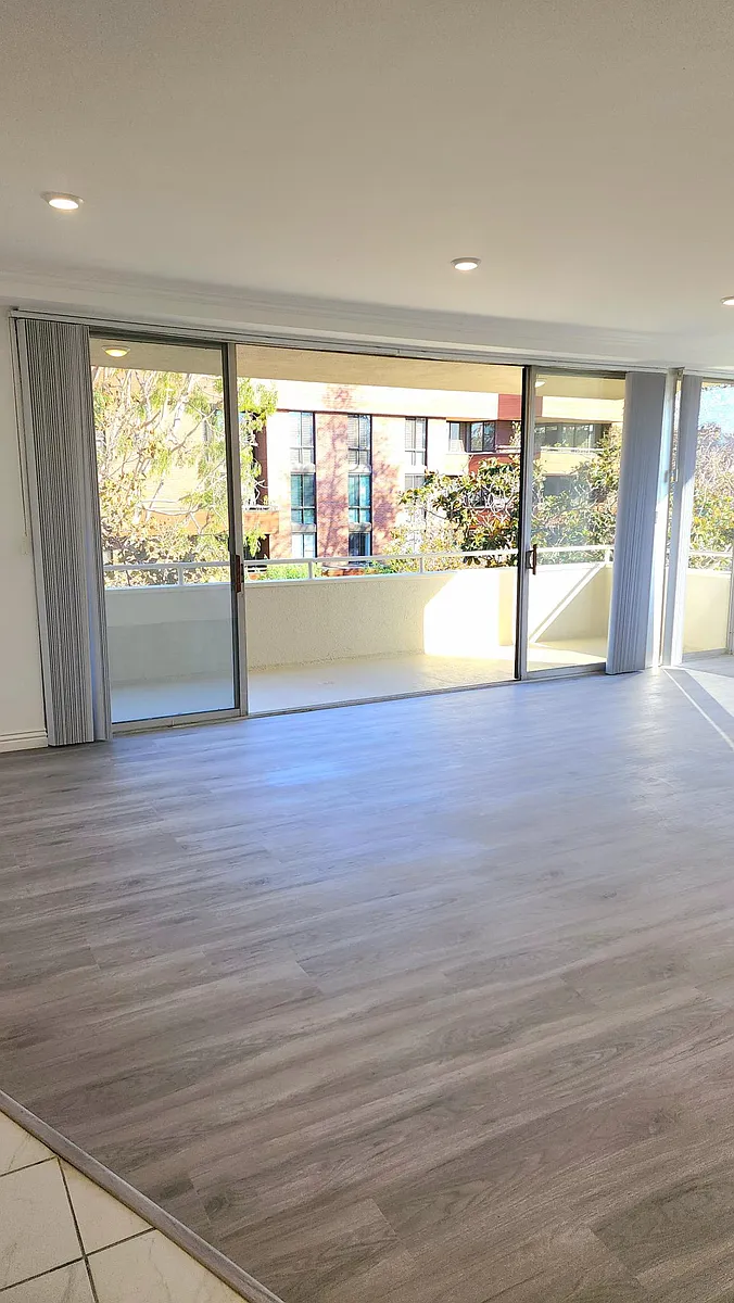 Living Room with Balcony - 303 N Swall Dr #301