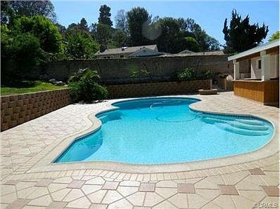 Newer pool deck w/ drainage system and overflow protection